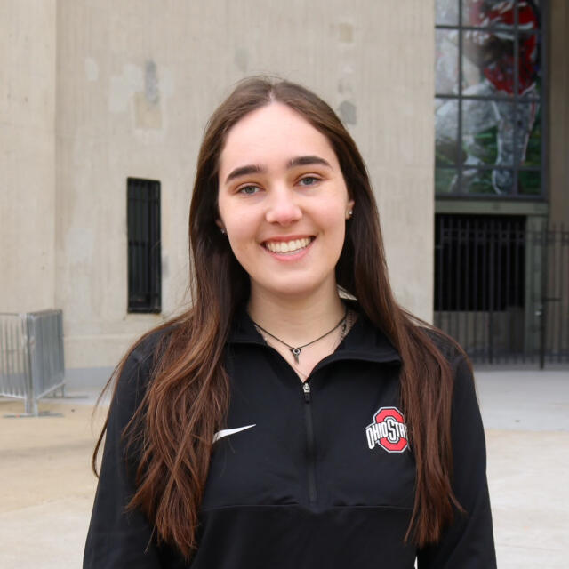 Lexi Simon standing in front of Ohio Stadium