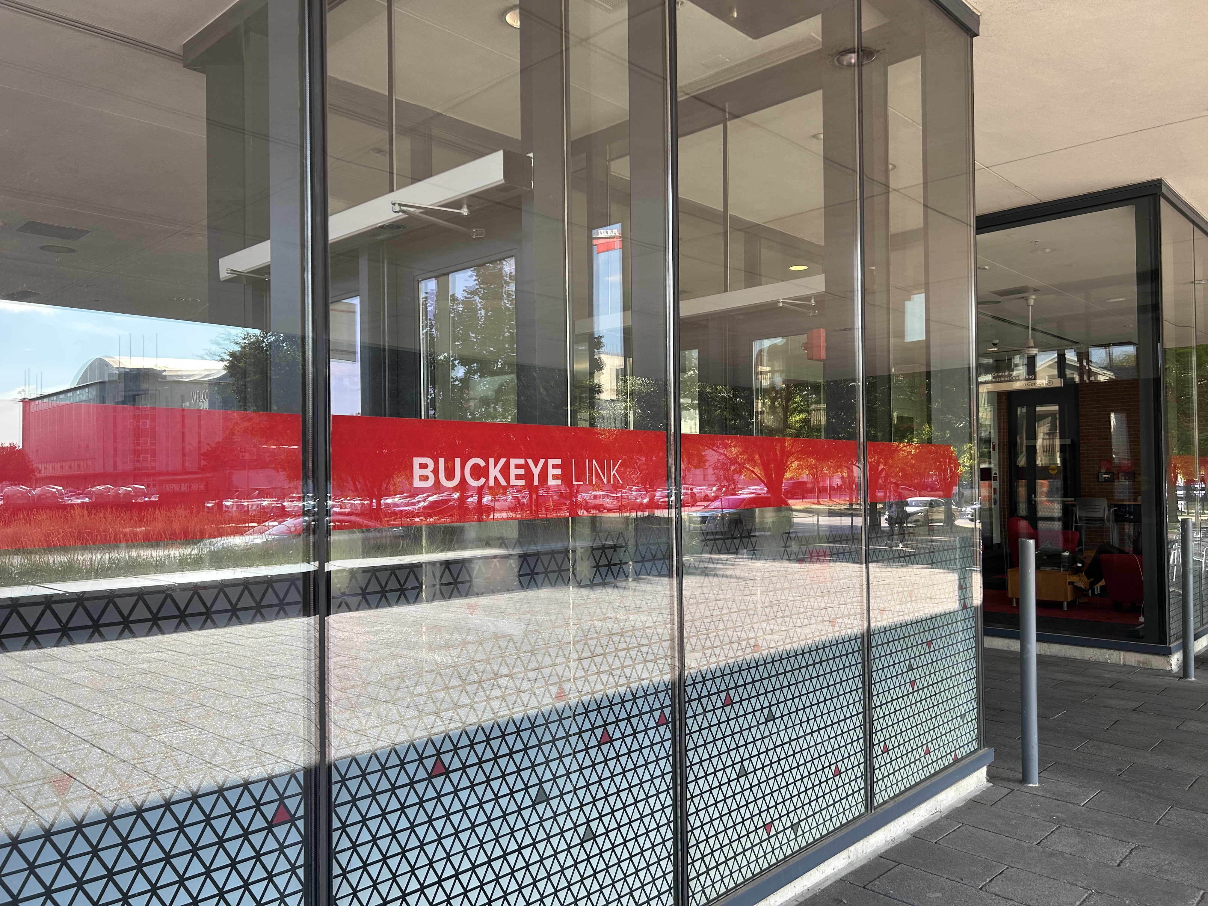 Windows outside of the Student Academic Services building with the words "Buckeye Link"