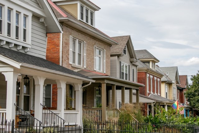 A side-angle view of six off-campus houses